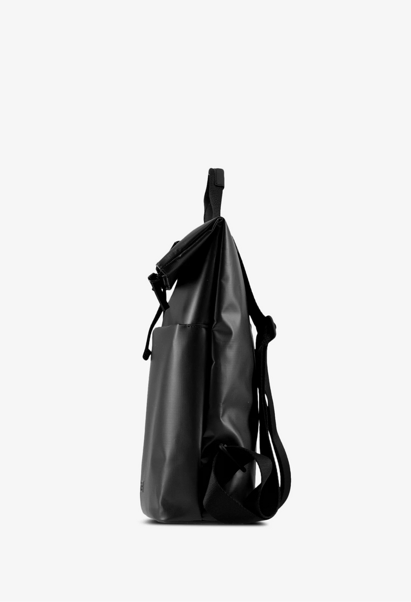 Jost Tolja con patta zaino