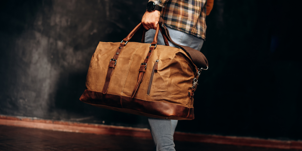 Duffle Bag, sportlich, robust, aus Leder, unterwegs getragen, lässiger Look